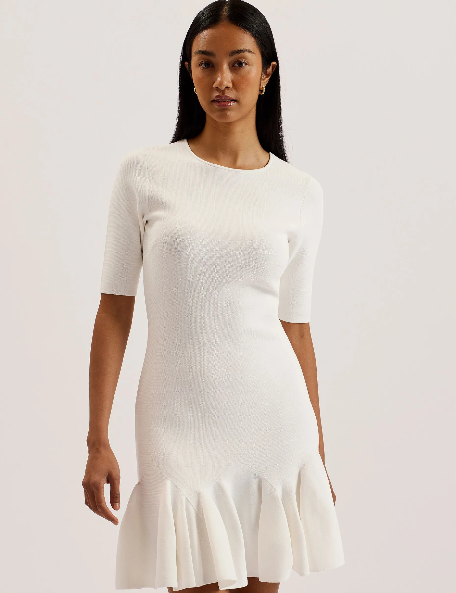 alzann_pleated_hem_knitte_0-1.webp Alzann Pleated Hem Knitted Bodycon Mini Dress