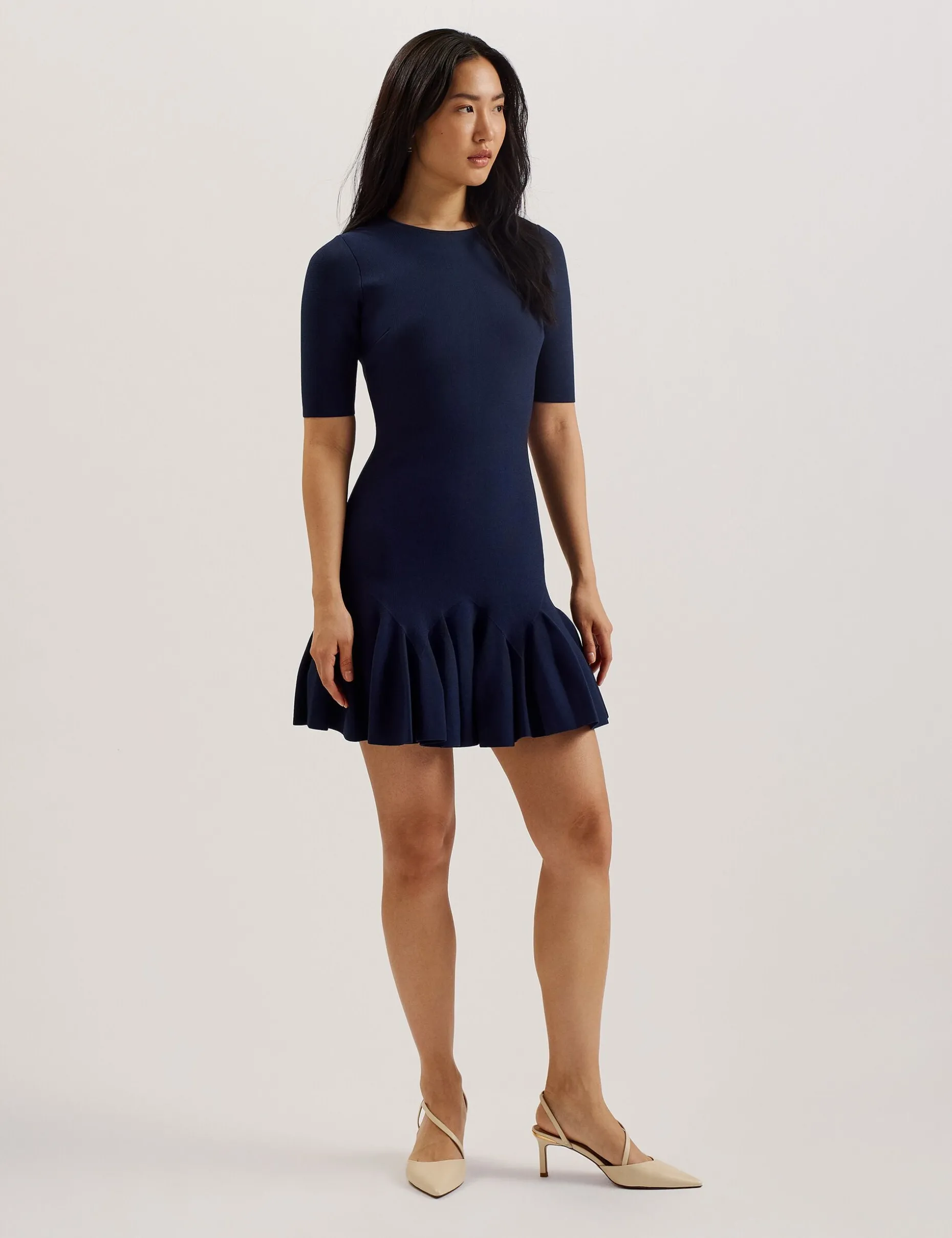 alzann_pleated_hem_knitte_1.webp Alzann Pleated Hem Knitted Bodycon Mini Dress