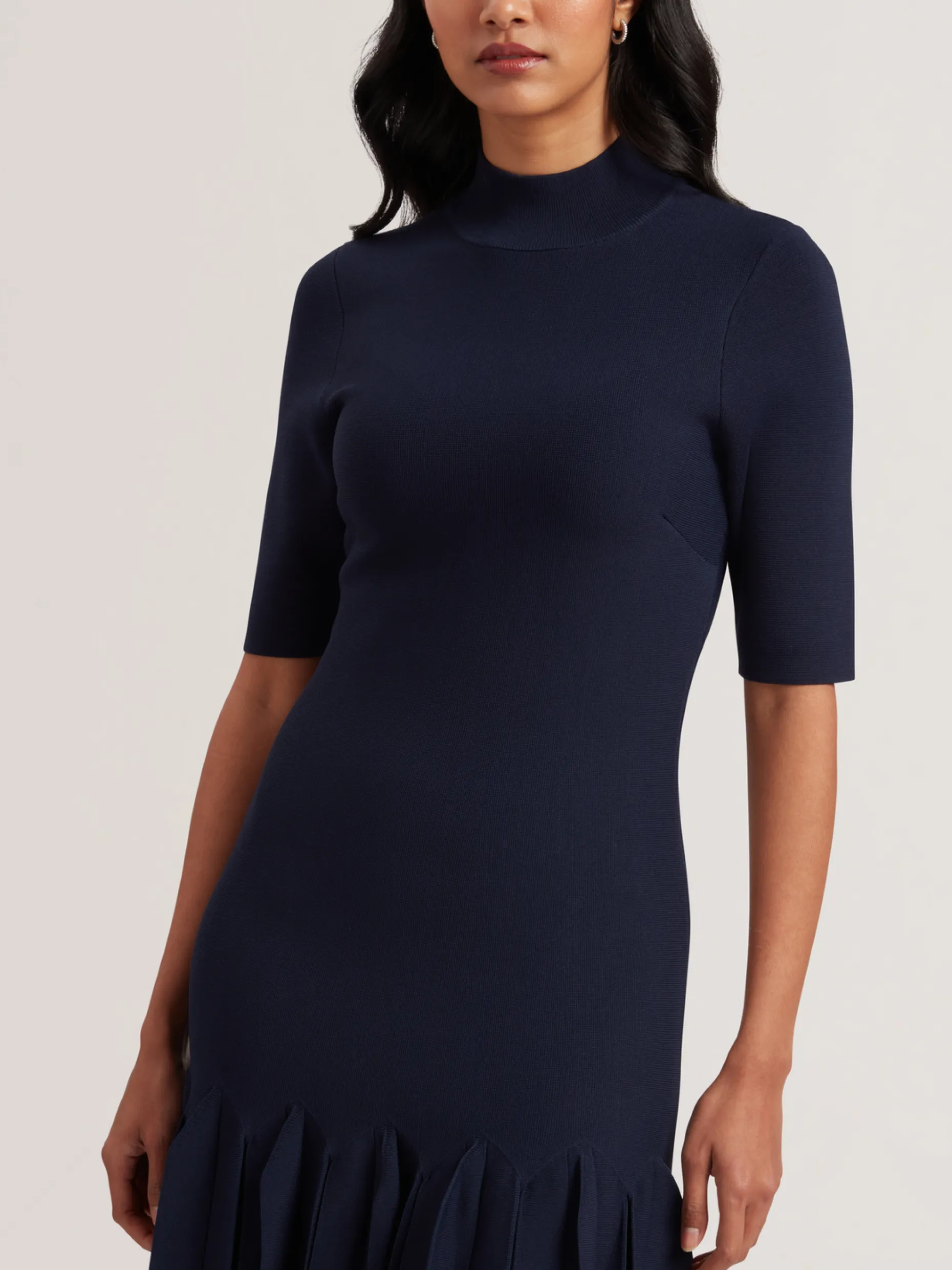 canddy_pleated_hem_bodyco_1-1.webp Canddy Pleated Hem Bodycon Knit Mini Dress
