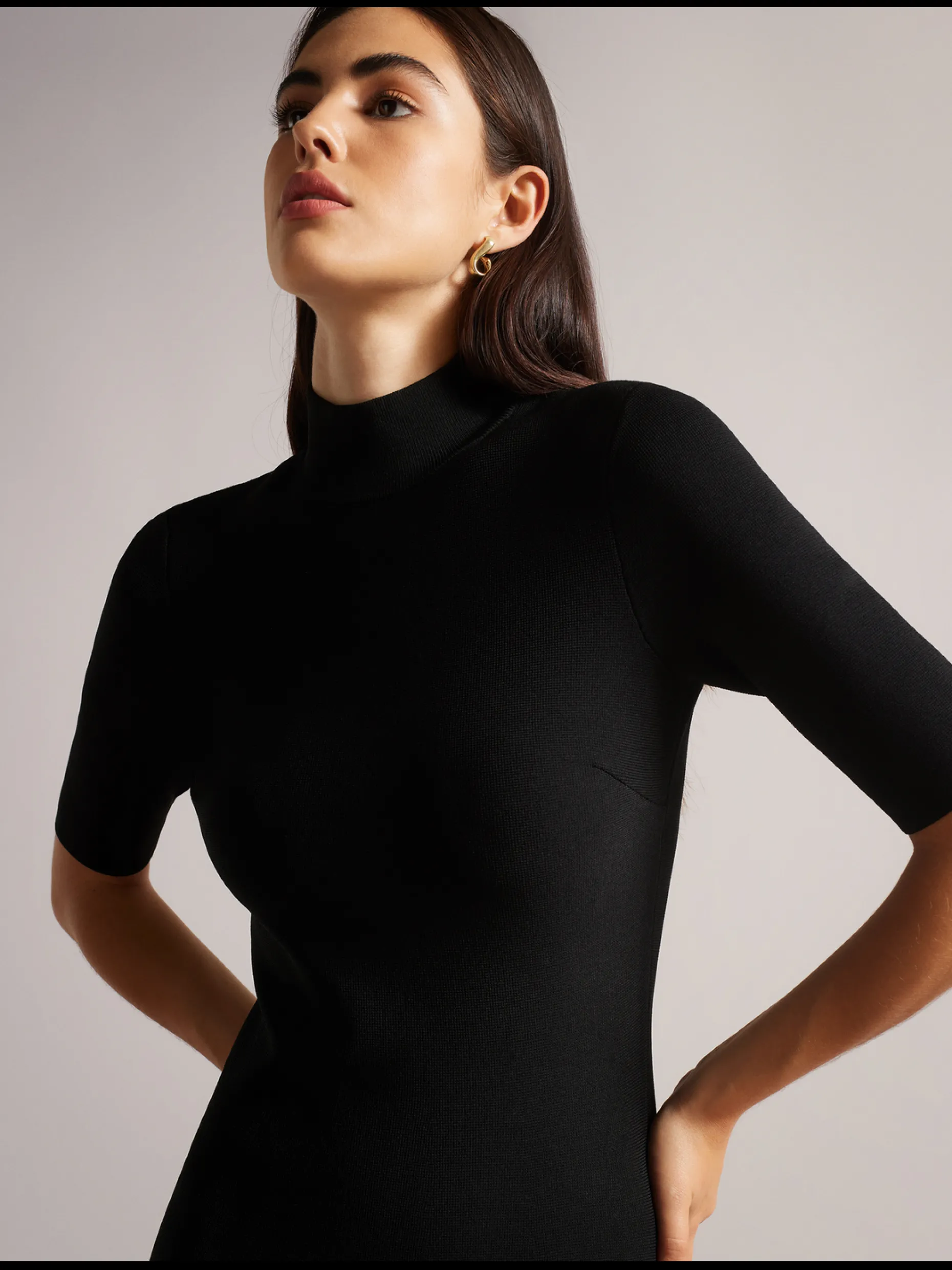 canddy_pleated_hem_bodyco_1.webp Canddy Pleated Hem Bodycon Knit Mini Dress