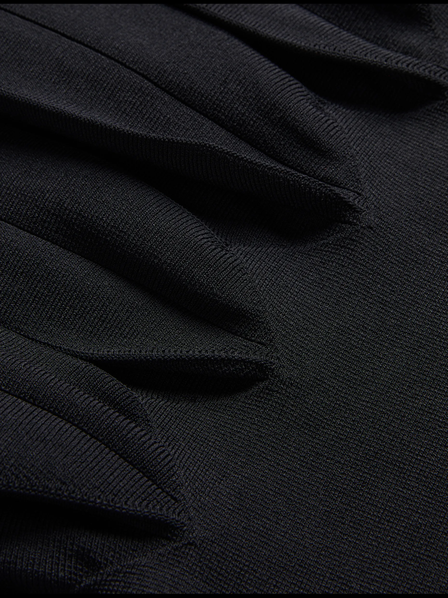 canddy_pleated_hem_bodyco_2.webp Canddy Pleated Hem Bodycon Knit Mini Dress