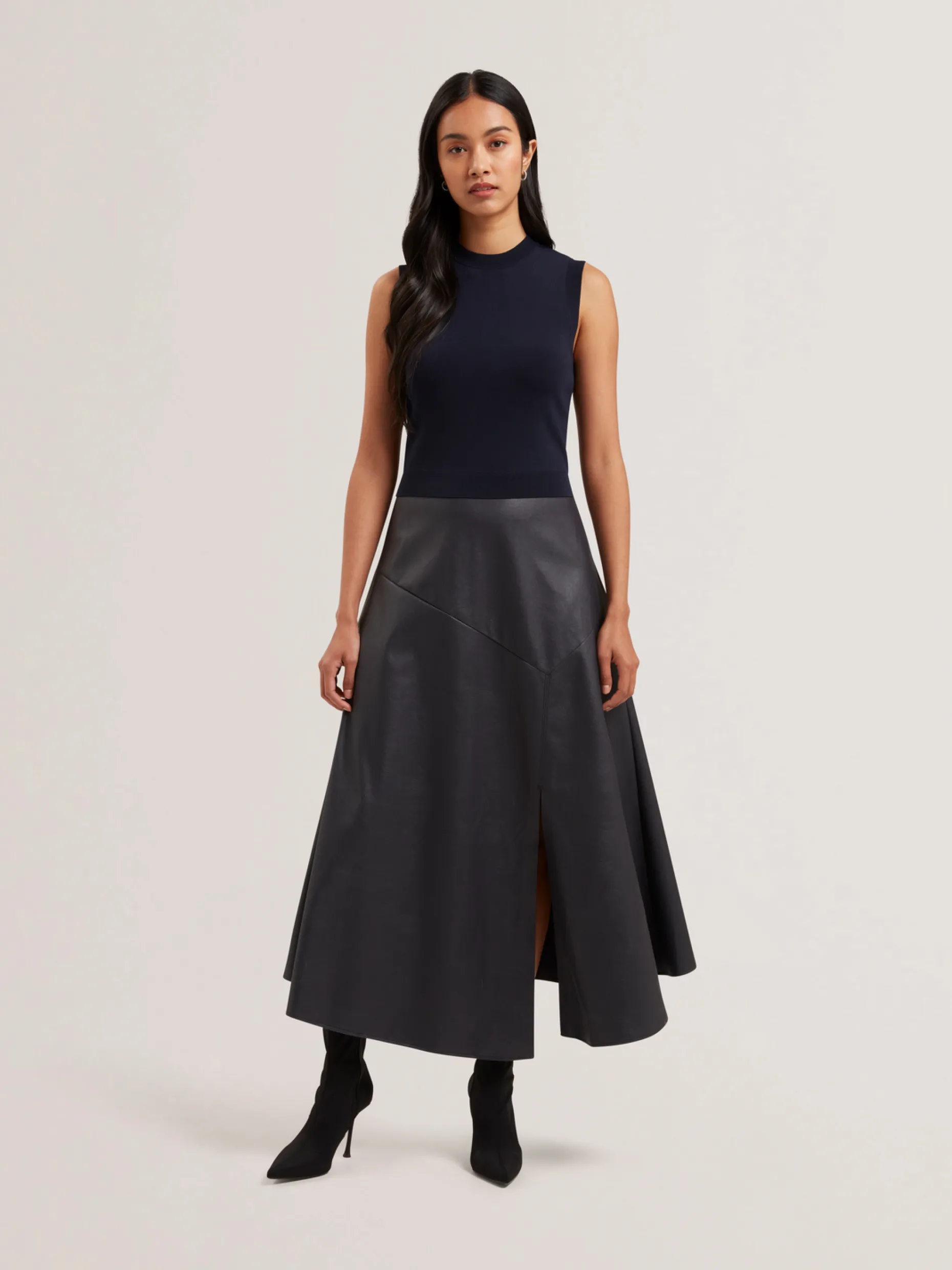 labasa_sleeveless_knit_fa_0.webp Labasa Sleeveless Knit Faux Leather Midi Dress