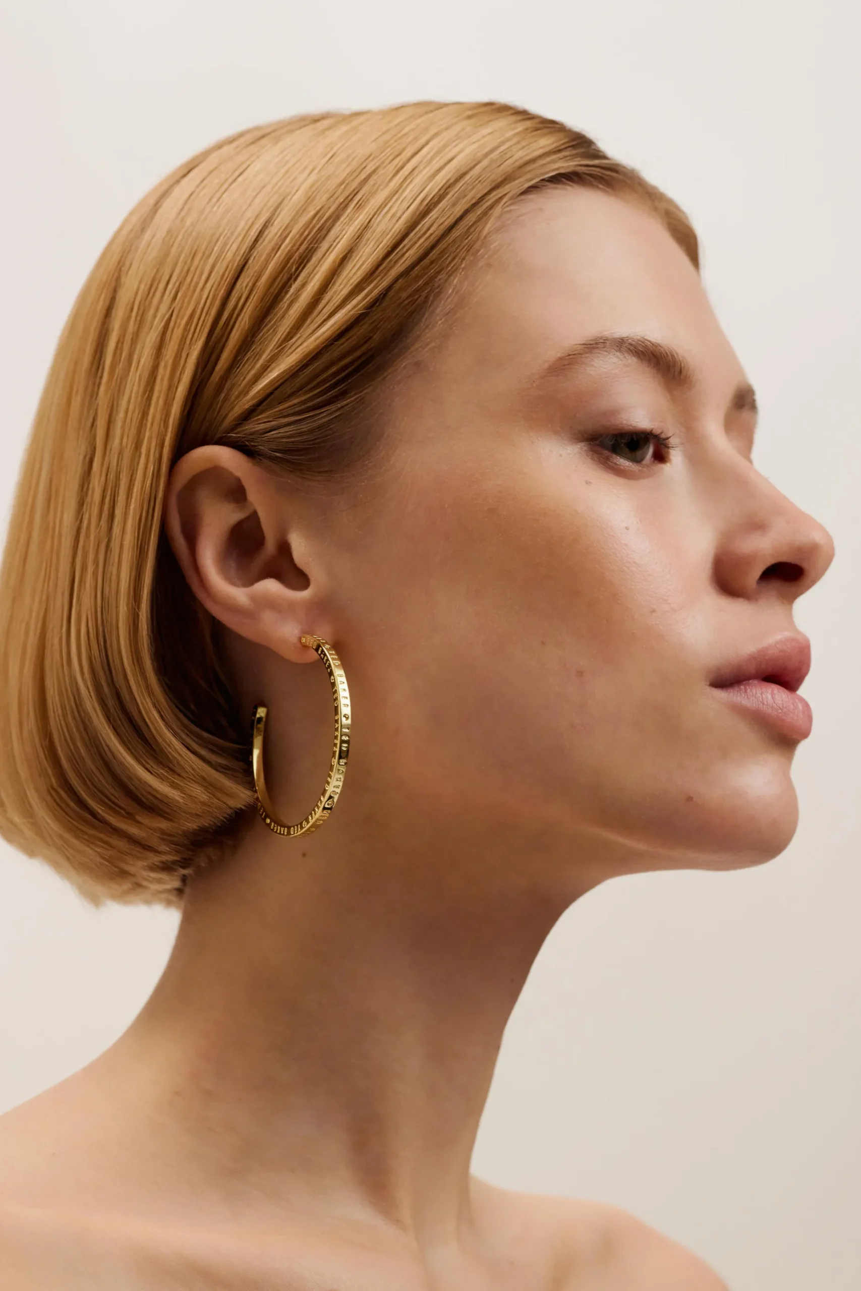 loa_logo_hoop_earrings_3.webp Loa Logo Hoop Earrings