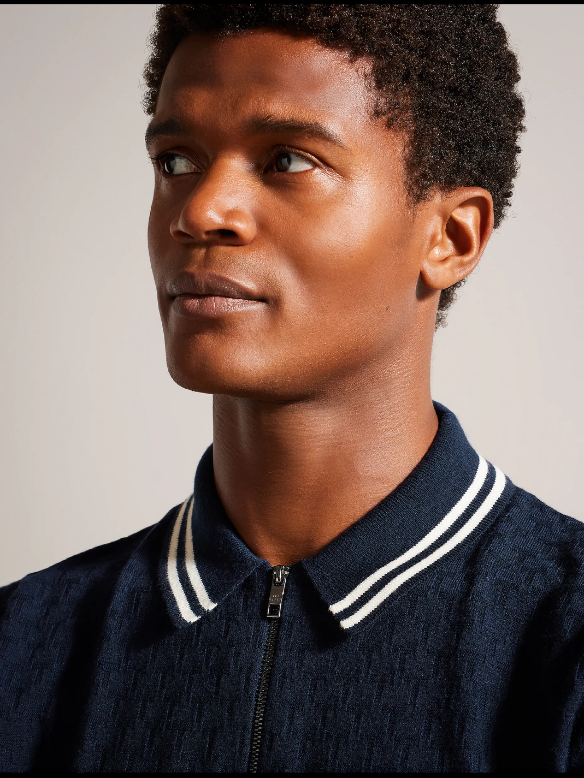 mahani_short_sleeve_zip_p_1.webp Mahani Short Sleeve Zip Polo