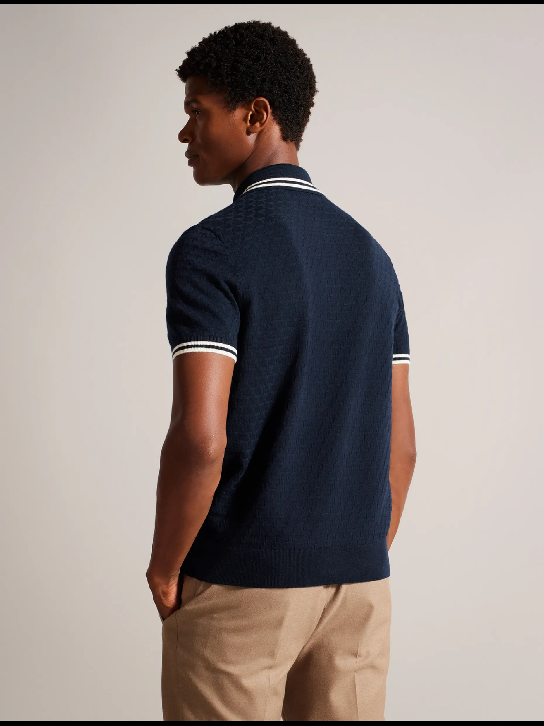 mahani_short_sleeve_zip_p_3.webp Mahani Short Sleeve Zip Polo