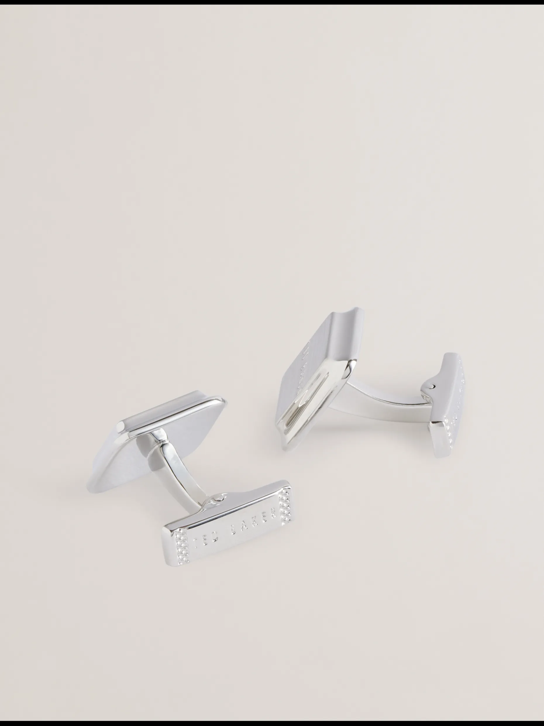 tedly_silver_branded_cuff_1.webp Tedly Silver Branded Cufflinks